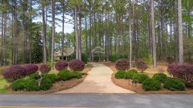 Don't miss this well cared for 4 sided brick home overlooking on Reynolds Lake Oconee - The Oconee in Georgia - for sale on GolfHomes.com, golf home, golf lot
