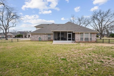 This beautiful  IMMACULATE home is located on the corner of a on Pecan Plantation Country Club in Texas - for sale on GolfHomes.com, golf home, golf lot