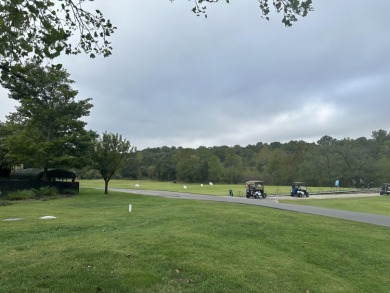 Walk-In Golf front condo with a pond view located  at on Ledgestone Country Club and Golf Course in Missouri - for sale on GolfHomes.com, golf home, golf lot