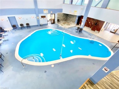GET THAT COZY CABIN FEEL AT A FRACTION OF THE COST! Year-round on Beech Mountain Club in North Carolina - for sale on GolfHomes.com, golf home, golf lot