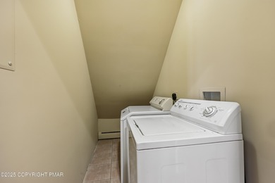 Experience refined luxury and serene privacy in this exceptional on Great Bear Golf and Country Club in Pennsylvania - for sale on GolfHomes.com, golf home, golf lot