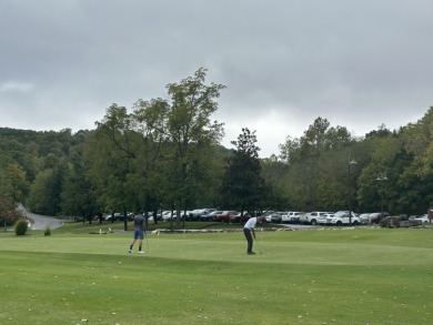 Walk-In Golf front condo with a pond view located  at on Ledgestone Country Club and Golf Course in Missouri - for sale on GolfHomes.com, golf home, golf lot