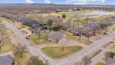 This beautiful  IMMACULATE home is located on the corner of a on Pecan Plantation Country Club in Texas - for sale on GolfHomes.com, golf home, golf lot