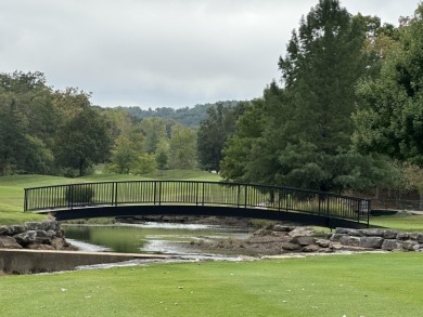 Walk-In Golf front condo with a pond view located  at on Ledgestone Country Club and Golf Course in Missouri - for sale on GolfHomes.com, golf home, golf lot