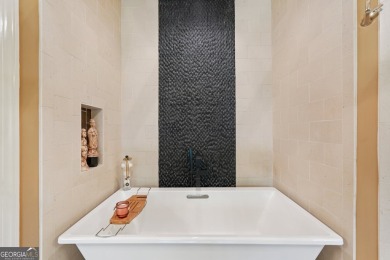 Discover your serene sanctuary at 38 Cavender Run, nestled on Achasta Golf Club in Georgia - for sale on GolfHomes.com, golf home, golf lot
