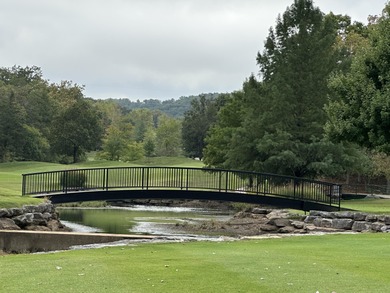 Walk-In Golf front condo with a pond view located at Stonebridge on Ledgestone Country Club and Golf Course in Missouri - for sale on GolfHomes.com, golf home, golf lot