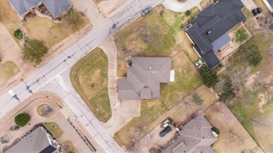 This beautiful  IMMACULATE home is located on the corner of a on Pecan Plantation Country Club in Texas - for sale on GolfHomes.com, golf home, golf lot