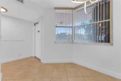 This beautifully renovated apartment seamlessly blends modern on Sunrise Lakes Phase IV Golf Course in Florida - for sale on GolfHomes.com, golf home, golf lot