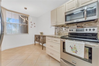 This beautifully renovated apartment seamlessly blends modern on Sunrise Lakes Phase IV Golf Course in Florida - for sale on GolfHomes.com, golf home, golf lot