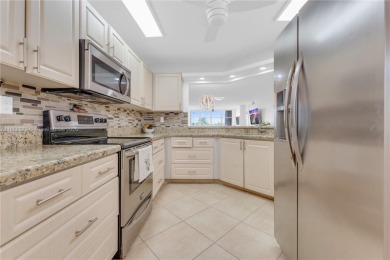 This beautifully renovated apartment seamlessly blends modern on Sunrise Lakes Phase IV Golf Course in Florida - for sale on GolfHomes.com, golf home, golf lot