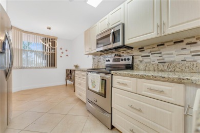 This beautifully renovated apartment seamlessly blends modern on Sunrise Lakes Phase IV Golf Course in Florida - for sale on GolfHomes.com, golf home, golf lot