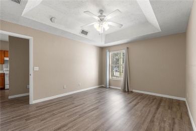 Gated community with golf course views. Look No Further...this on The Golf Club of Ocala in Florida - for sale on GolfHomes.com, golf home, golf lot