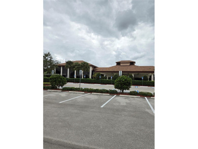 Enjoy serene lake and golf course views from this first-floor on Flamingo Lakes Country Club in Florida - for sale on GolfHomes.com, golf home, golf lot