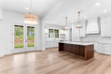 EXPERIENCE THE PERFECT BLEND OF LUXURY AND COMFORT IN THIS on Harbor Club Golf and Country Club in Georgia - for sale on GolfHomes.com, golf home, golf lot