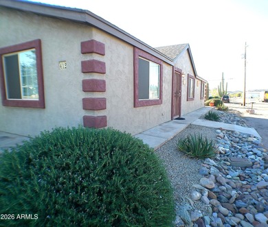 This Stucco 2 Bedroom 2 Full Bath home has an oversized 2nd on Queen Valley Golf Course in Arizona - for sale on GolfHomes.com, golf home, golf lot