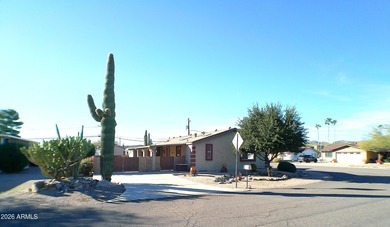 This Stucco 2 Bedroom 2 Full Bath home has an oversized 2nd on Queen Valley Golf Course in Arizona - for sale on GolfHomes.com, golf home, golf lot