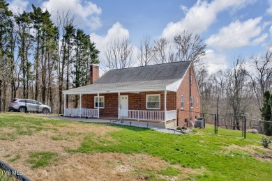 This 4 bed, 2 bath residence boasts a host of features that make on Crocketts Ridge Golf Club in Tennessee - for sale on GolfHomes.com, golf home, golf lot