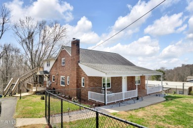 This 4 bed, 2 bath residence boasts a host of features that make on Crocketts Ridge Golf Club in Tennessee - for sale on GolfHomes.com, golf home, golf lot