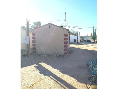 This Stucco 2 Bedroom 2 Full Bath home has an oversized 2nd on Queen Valley Golf Course in Arizona - for sale on GolfHomes.com, golf home, golf lot