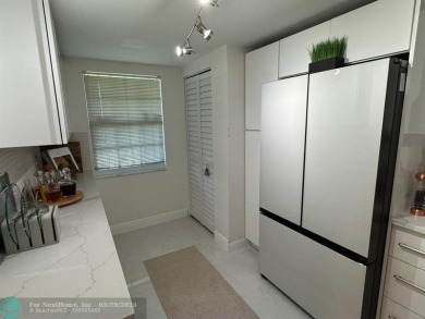 Stunningly remodeled 2/2 condo located in The Oaks at Palm Aire on Palm-Aire Country Club and Resort - The Oaks in Florida - for sale on GolfHomes.com, golf home, golf lot
