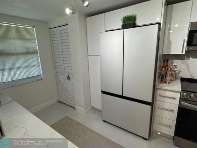 Stunningly remodeled 2/2 condo located in The Oaks at Palm Aire on Palm-Aire Country Club and Resort - The Oaks in Florida - for sale on GolfHomes.com, golf home, golf lot