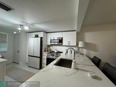 Stunningly remodeled 2/2 condo located in The Oaks at Palm Aire on Palm-Aire Country Club and Resort - The Oaks in Florida - for sale on GolfHomes.com, golf home, golf lot