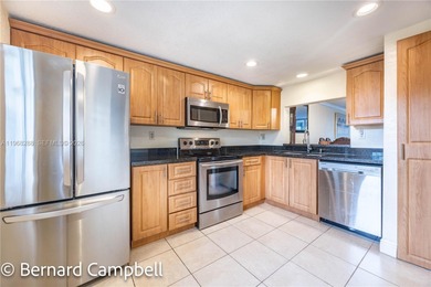 Experience resort-style living in a beautifully maintained on Inverrary Country Club in Florida - for sale on GolfHomes.com, golf home, golf lot