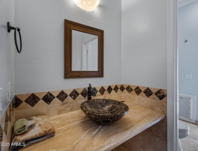 Exceptional custom home in the exclusive, gated golf course on Palm Valley Golf Club  in Arizona - for sale on GolfHomes.com, golf home, golf lot