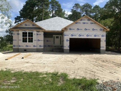 This floor-plan offers 1,902 SF with 4 Bedrooms and two on Harbour Point Golf Club in North Carolina - for sale on GolfHomes.com, golf home, golf lot