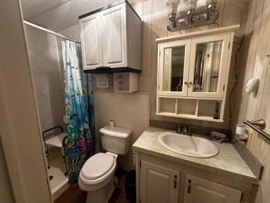 Welcome home Seniors to this perfect community with a 9 hole on Spanish Lakes I in Florida - for sale on GolfHomes.com, golf home, golf lot