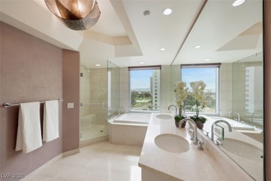 A stunning corner residence with floor-to-ceiling windows on Las Vegas Country Club in Nevada - for sale on GolfHomes.com, golf home, golf lot