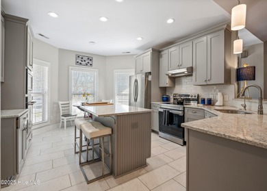 Step inside this inviting 3-bedroom, 2-bath home featuring a on Members Club At St. James Plantation in North Carolina - for sale on GolfHomes.com, golf home, golf lot