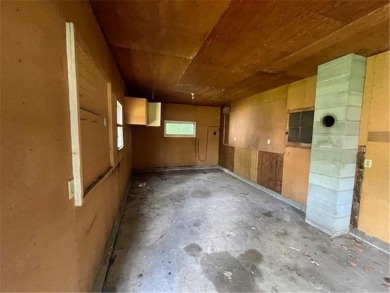 In the heart of town, this 2 story is nestled in between mature on The Amery Golf Club in Wisconsin - for sale on GolfHomes.com, golf home, golf lot
