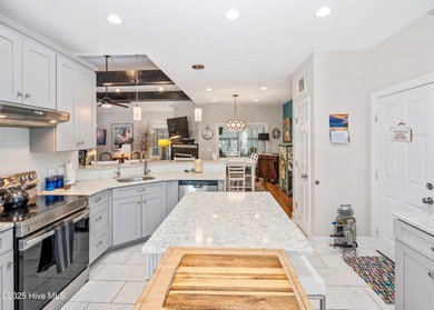 Step inside this inviting 3-bedroom, 2-bath home featuring a on Members Club At St. James Plantation in North Carolina - for sale on GolfHomes.com, golf home, golf lot