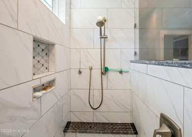 Step inside this inviting 3-bedroom, 2-bath home featuring a on Members Club At St. James Plantation in North Carolina - for sale on GolfHomes.com, golf home, golf lot