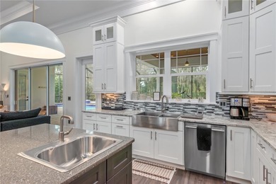 Come and enjoy this stunning custom residence in one of Central on Golden Ocala Golf and Equestrian Club in Florida - for sale on GolfHomes.com, golf home, golf lot