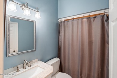 Step inside this inviting 3-bedroom, 2-bath home featuring a on Members Club At St. James Plantation in North Carolina - for sale on GolfHomes.com, golf home, golf lot