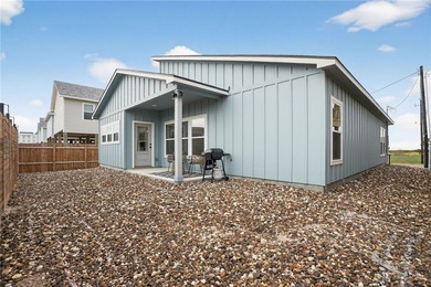 Skip the stairs and step into this modern coastal sanctuary! on Palmilla Beach Golf Club in Texas - for sale on GolfHomes.com, golf home, golf lot