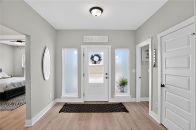 Skip the stairs and step into this modern coastal sanctuary! on Palmilla Beach Golf Club in Texas - for sale on GolfHomes.com, golf home, golf lot