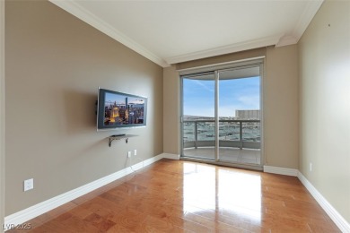 A stunning corner residence with floor-to-ceiling windows on Las Vegas Country Club in Nevada - for sale on GolfHomes.com, golf home, golf lot