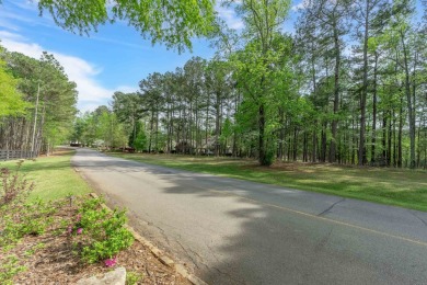 Discover the perfect canvas for your dream home on this on Reynolds Lake Oconee - The Oconee in Georgia - for sale on GolfHomes.com, golf home, golf lot