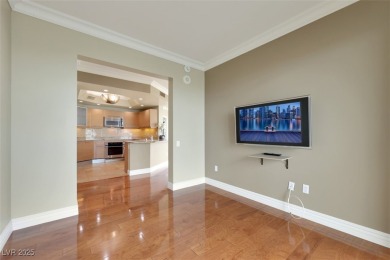 A stunning corner residence with floor-to-ceiling windows on Las Vegas Country Club in Nevada - for sale on GolfHomes.com, golf home, golf lot
