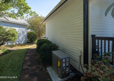 Step inside this inviting 3-bedroom, 2-bath home featuring a on Members Club At St. James Plantation in North Carolina - for sale on GolfHomes.com, golf home, golf lot