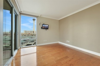 A stunning corner residence with floor-to-ceiling windows on Las Vegas Country Club in Nevada - for sale on GolfHomes.com, golf home, golf lot