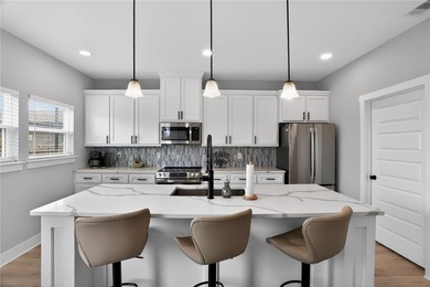 Skip the stairs and step into this modern coastal sanctuary! on Palmilla Beach Golf Club in Texas - for sale on GolfHomes.com, golf home, golf lot