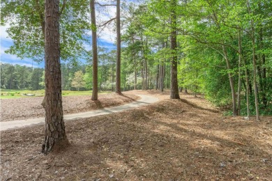 Discover the perfect canvas for your dream home on this on Reynolds Lake Oconee - The Oconee in Georgia - for sale on GolfHomes.com, golf home, golf lot