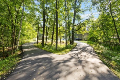 Beautifully updated 2 story on a wooded 2.7 acre lot with a on Thornberry Creek At Oneida in Wisconsin - for sale on GolfHomes.com, golf home, golf lot