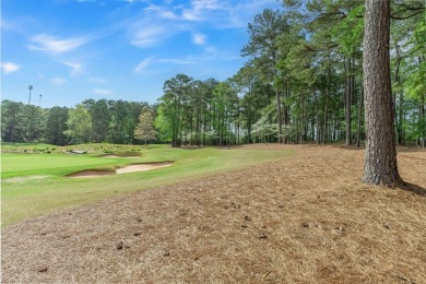 Discover the perfect canvas for your dream home on this on Reynolds Lake Oconee - The Oconee in Georgia - for sale on GolfHomes.com, golf home, golf lot