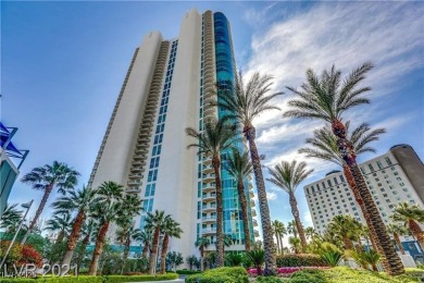 A stunning corner residence with floor-to-ceiling windows on Las Vegas Country Club in Nevada - for sale on GolfHomes.com, golf home, golf lot