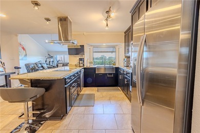 Welcome to this beautifully renovated Courtyard Townhome on Corpus Christi Country Club Golf Course in Texas - for sale on GolfHomes.com, golf home, golf lot